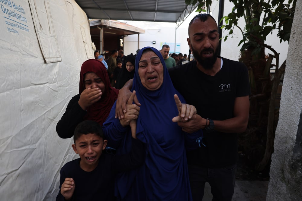 Family crying in Gaza