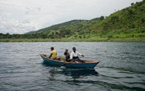 MSF staff on a boat in Kabanga village, South Kivu DRC