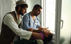 A child being examined by a doctors at Doctors Without Borders Kunduz Trauma Centre