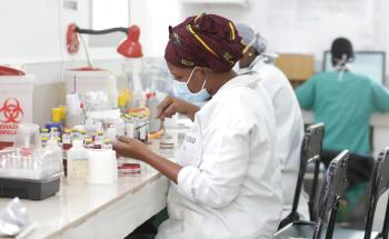 A technician from the bacteriology laboratory of the CSref of Koutiala seeds culture media in order to carry out identification tests on colonies Labo CSREF. Antibiotic resistant bacteria in low income countries.