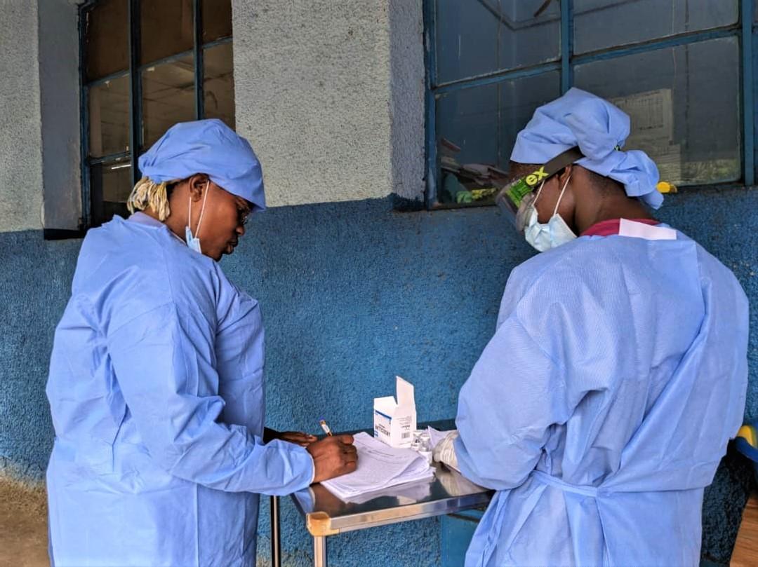 Mpox Vaccines - Two health workers talk at the Budjala general hospital, supported by MSF. MSF also deployed a team in the Budjala health zone in South Ubangi to support health authorities in the response against Mpox. 