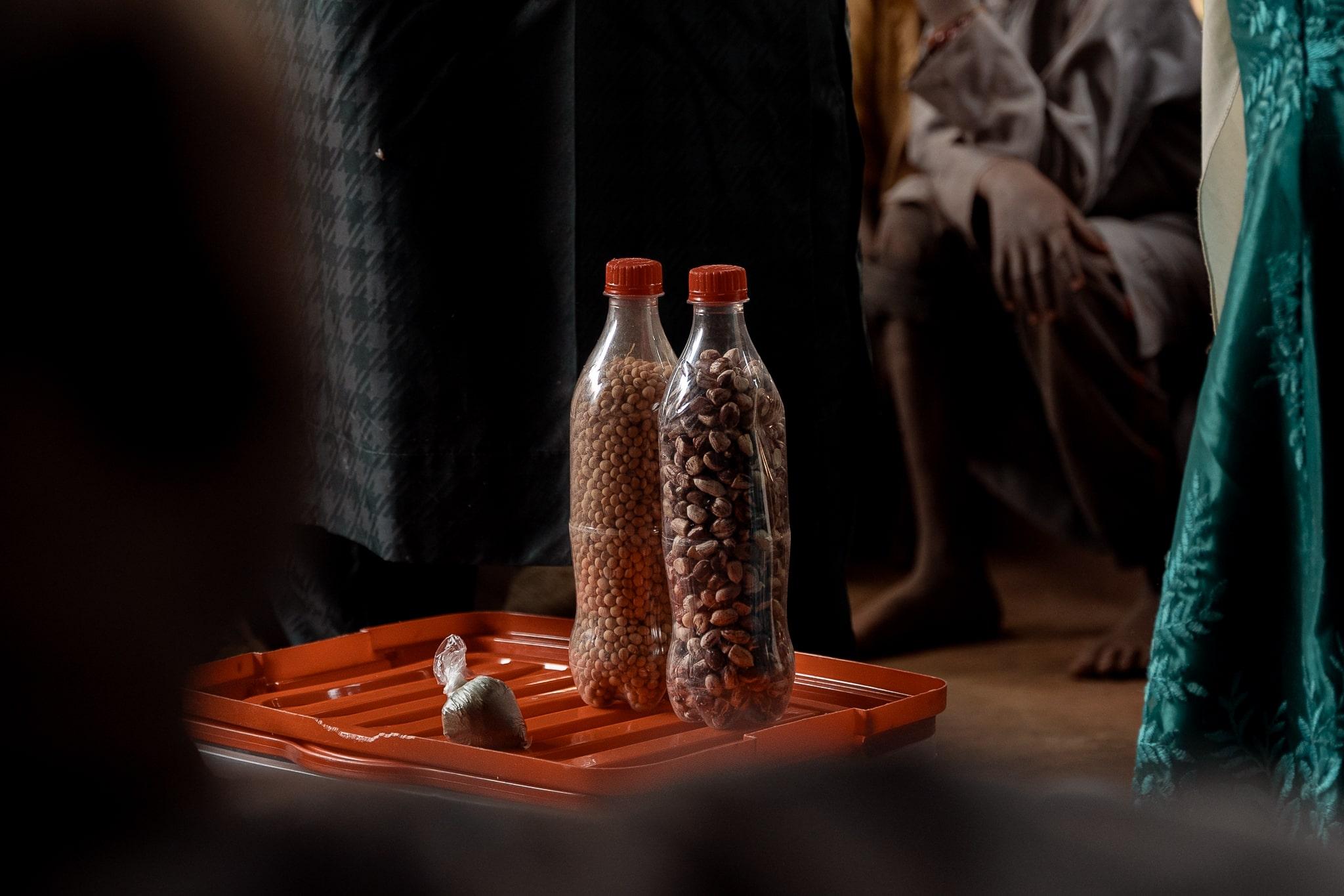 Acute Malnutrition in Nigeria: View of some of the ingredients required to prepare Tom Brown are shown during a recipe demonstration. In Kebbi, the recipe is based on a simple ratio: 6 measures of sorghum or millet, 3 measures of soybeans and 1 measure of ground nuts. Those ingredients are cultivated in northern Nigeria and available on local markets.