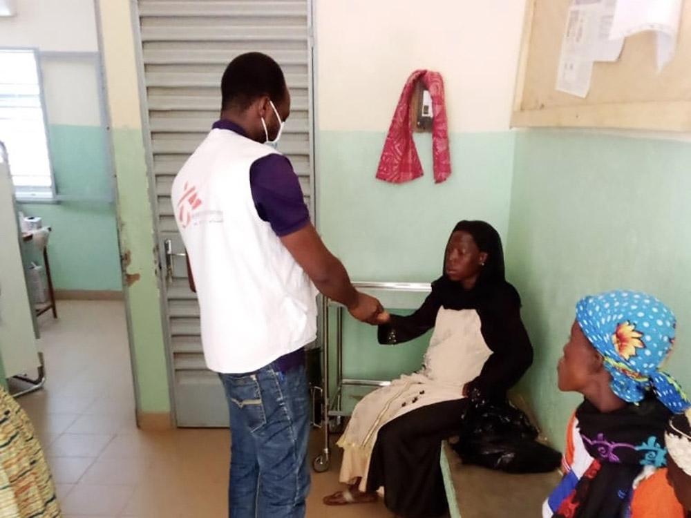 Health worker with a patient in Burkina Faso