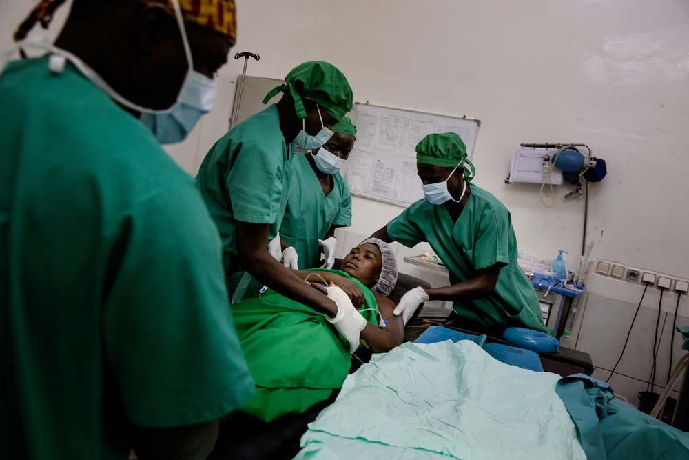 A picture of doctors and nurses with France after her surgery in Bangui