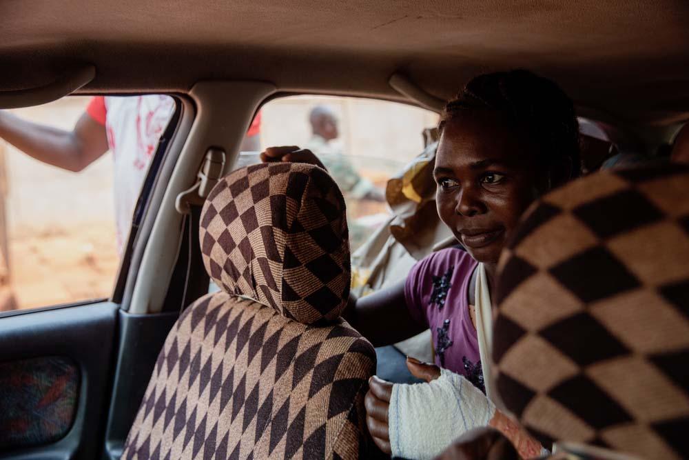 A picture of France in a car on her way home from SICA Hospital