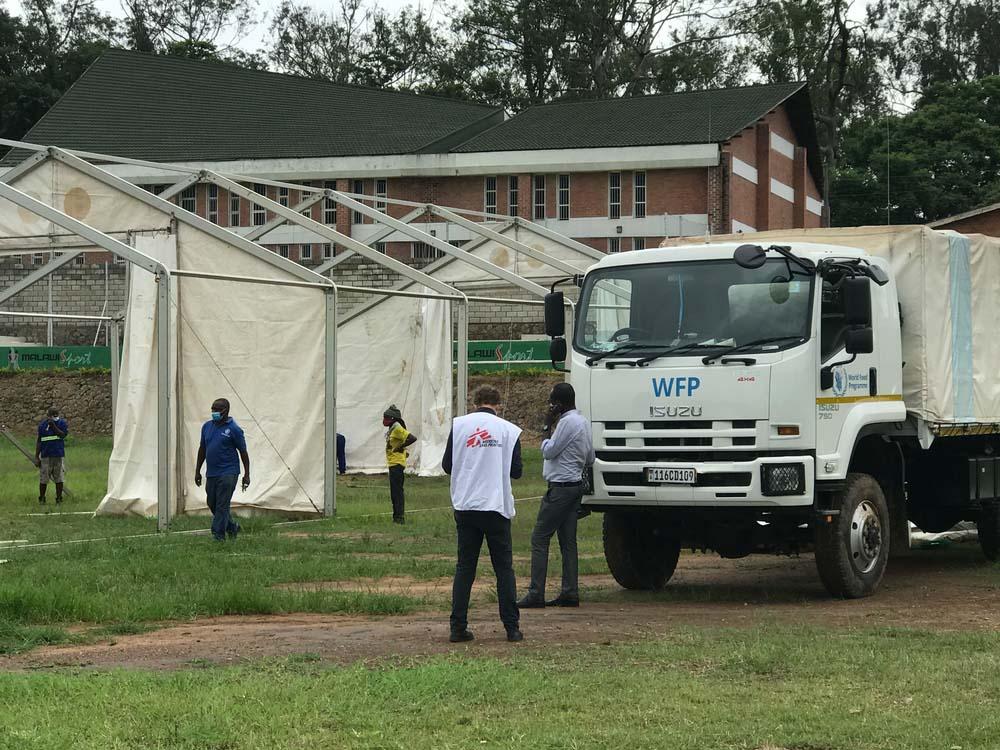 A picture of MSF staff setting up a COVID  treatment centre in Malawi