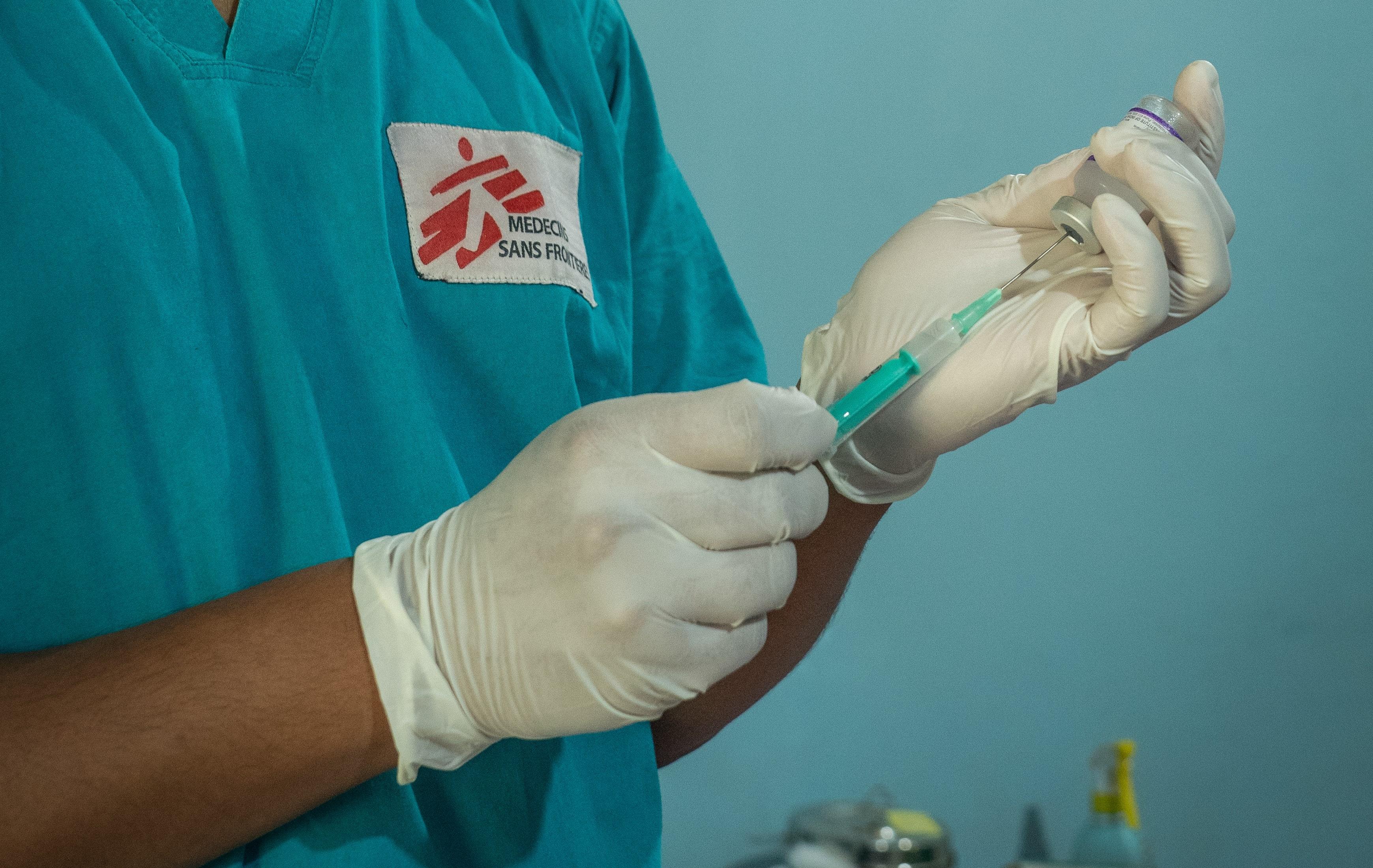 Hep C in Cox's Bazar MSF Nurse, Mahadee Hasan Mahim is preparing a vaccine to register to the patient at MSF’s Jamtoli clinic at the Rohingya refugee camp in Bangladesh.