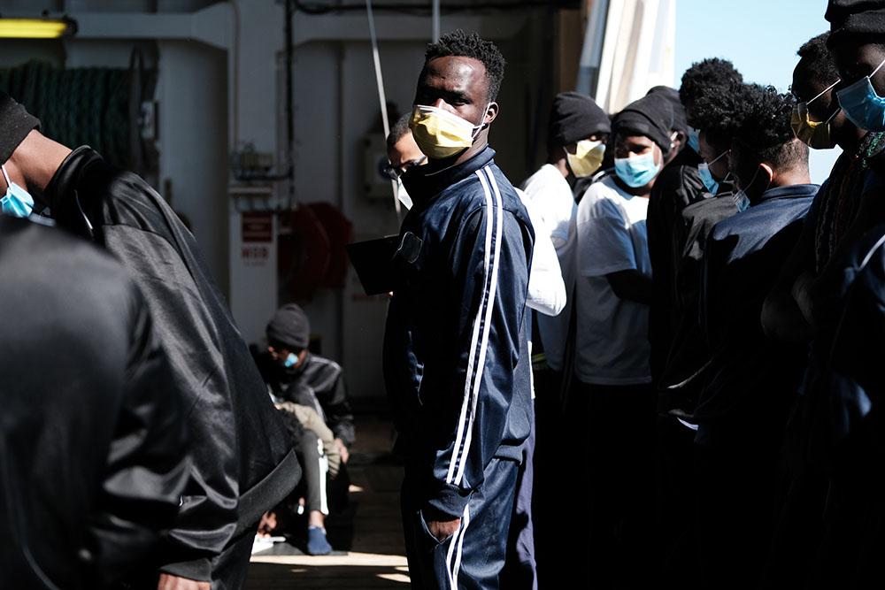 Jeans from Côte d'Ivoire poses for a portrait on board the rescue ship, Geo Barents, a rescue ship operated by MSF. Rotation 8. Central Mediterranean Sea, March 2022. 