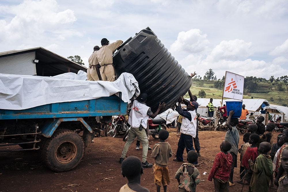 WASH (Water, sanitation and Hygiene) activities by MSF teams in Rhoe camp. After successive attacks in the region forced more than 40,000 additional people to take refuge in the Rhoe site in 2 months, bringing its population to more than 65,000 displaced, MSF increased WASH activities to provide clean water and latrines to displaced people in the camp.