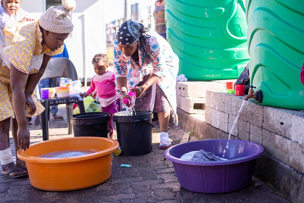 The sun has shone almost every day since flash floods tore through the KwaZulu-Natal province’s most populous urban areas on 11 April, but for many people the suffering continues. Large parts of the eThekwini Municipality around the coastal city of Durban, remain without water and sanitation, with no indication of when these services will be restored.