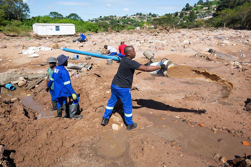 The sun has shone almost every day since flash floods tore through the KwaZulu-Natal province’s most populous urban areas on 11 April, but for many people the suffering continues. Large parts of the eThekwini Municipality around the coastal city of Durban, remain without water and sanitation, with no indication of when these services will be restored.