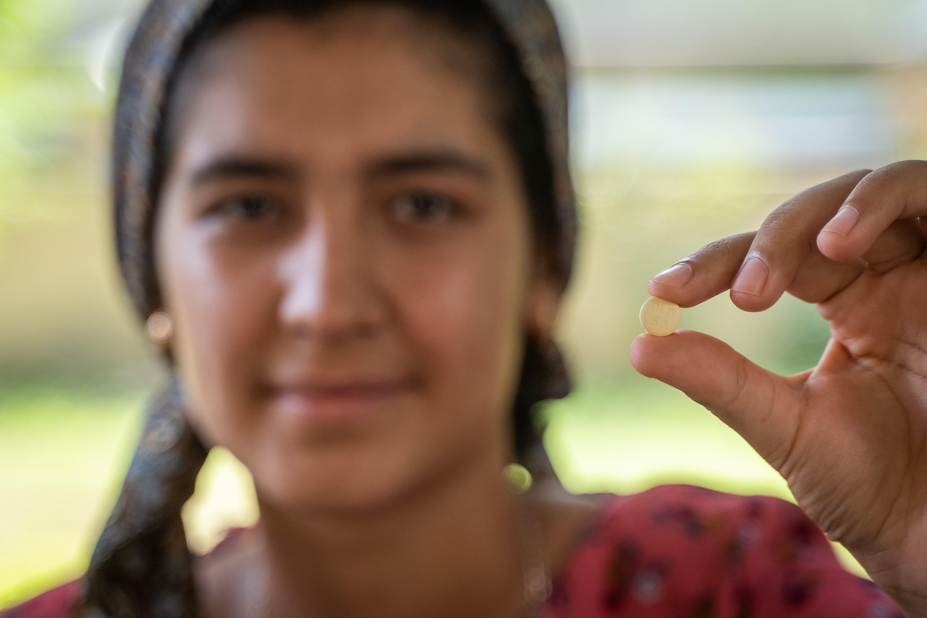 Drug-Resistant TB in Tajikistan: Mahina taking TB medication