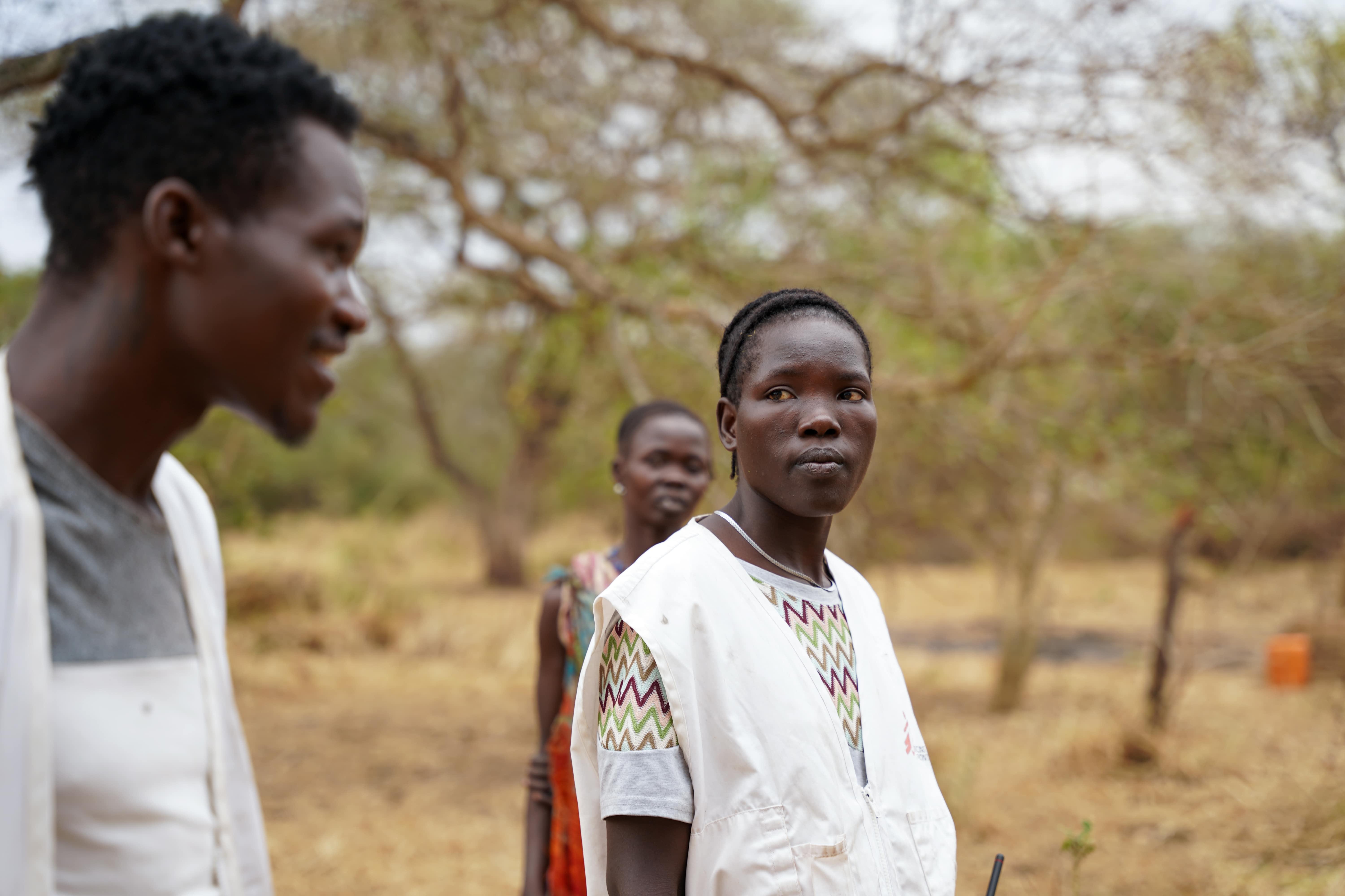Cattle Keepers in South Sudan: Beatrice Johnson, community health educator looks at her colleague during an outreach visit to semi-nomadic communities in Labarab, Greater Pibor Administrative Area.