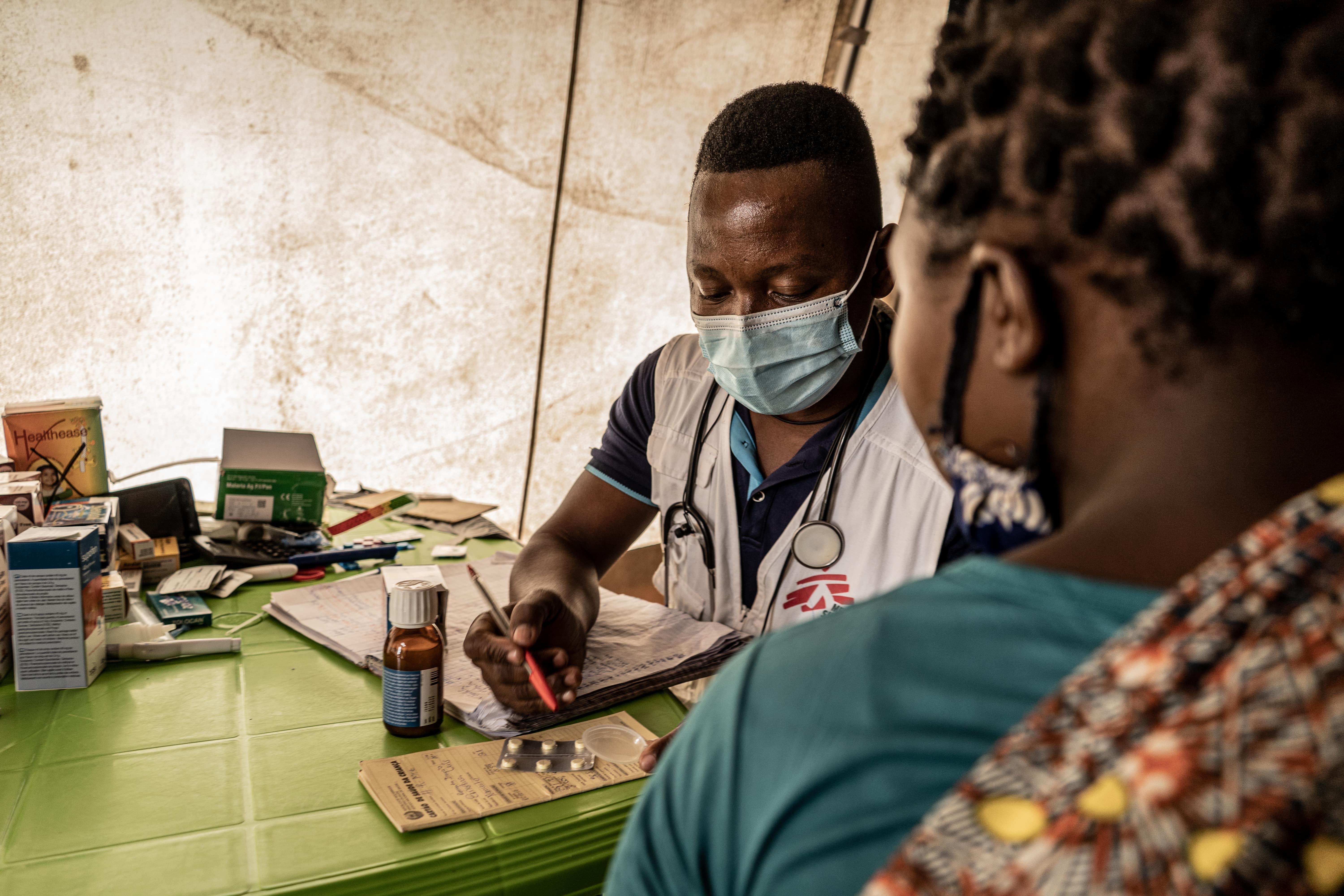 40 Years of Medical Services in Mozambique: Physician, Nazario Jaime, is seen during a consultation with a patient living in the Nicuapa site in Cabo Delgado province.