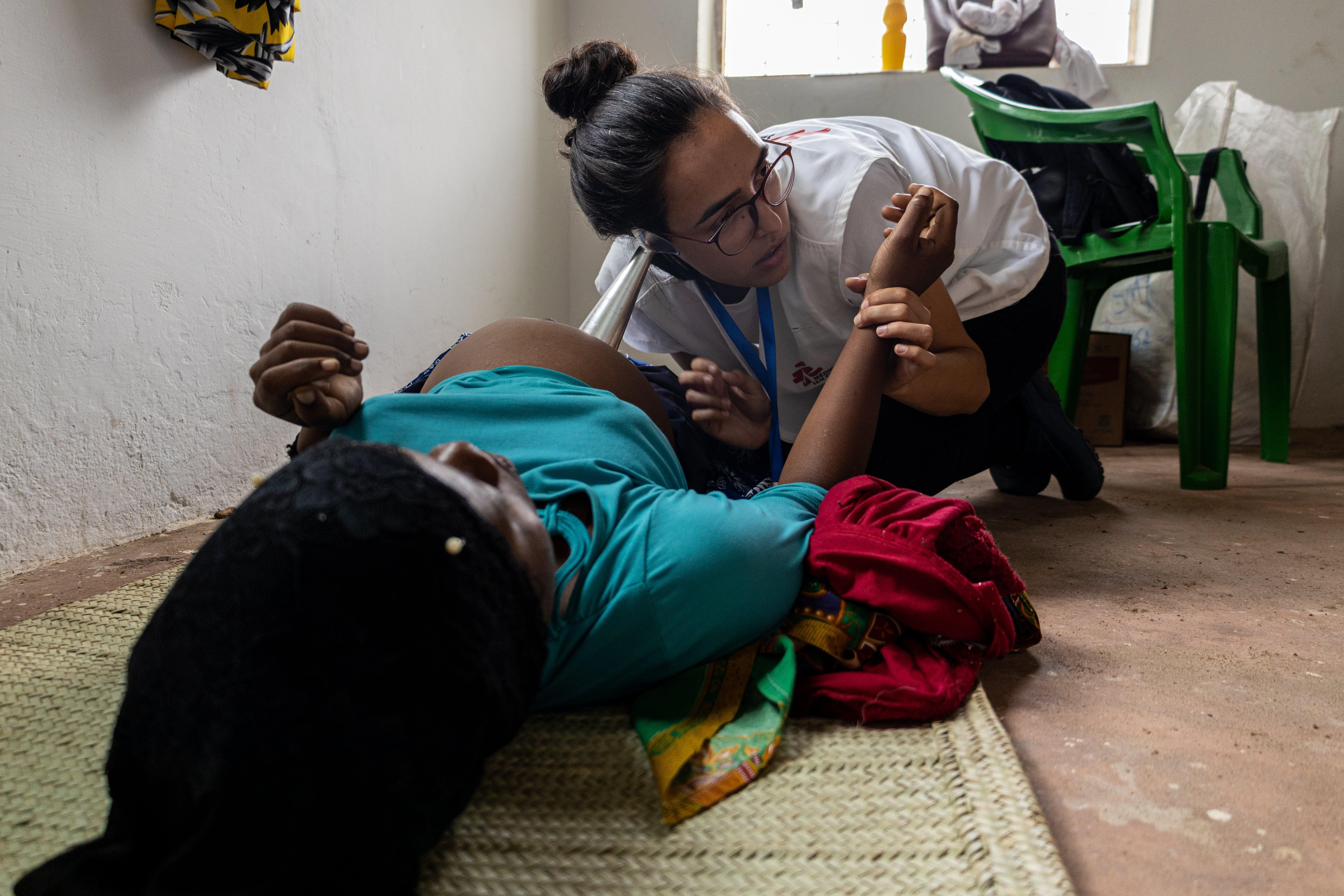 40 Years of Medical Services in Mozambique: An MSF midwife examines a patient in Palma.