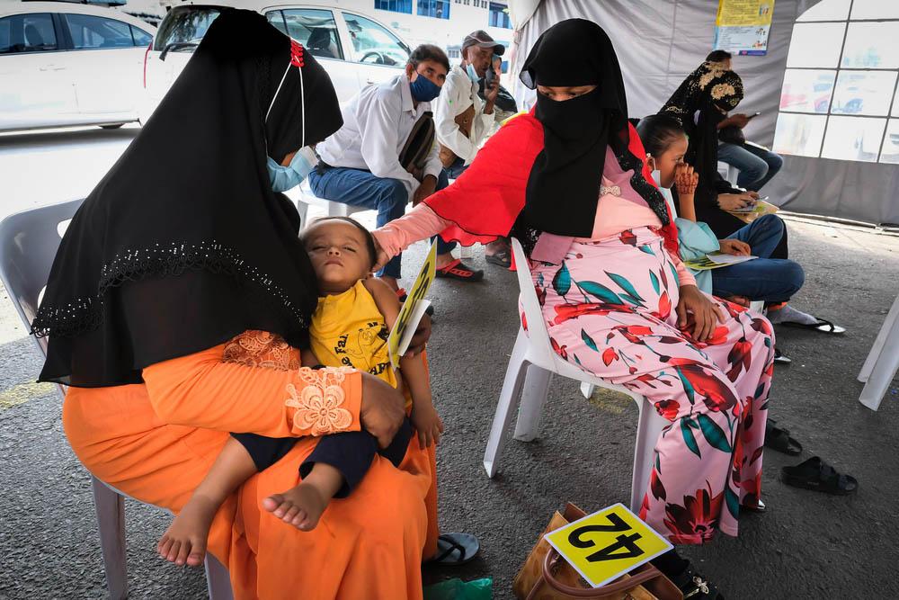 Two women at Doctors Without Borders (MSF) clinic in Butterworth