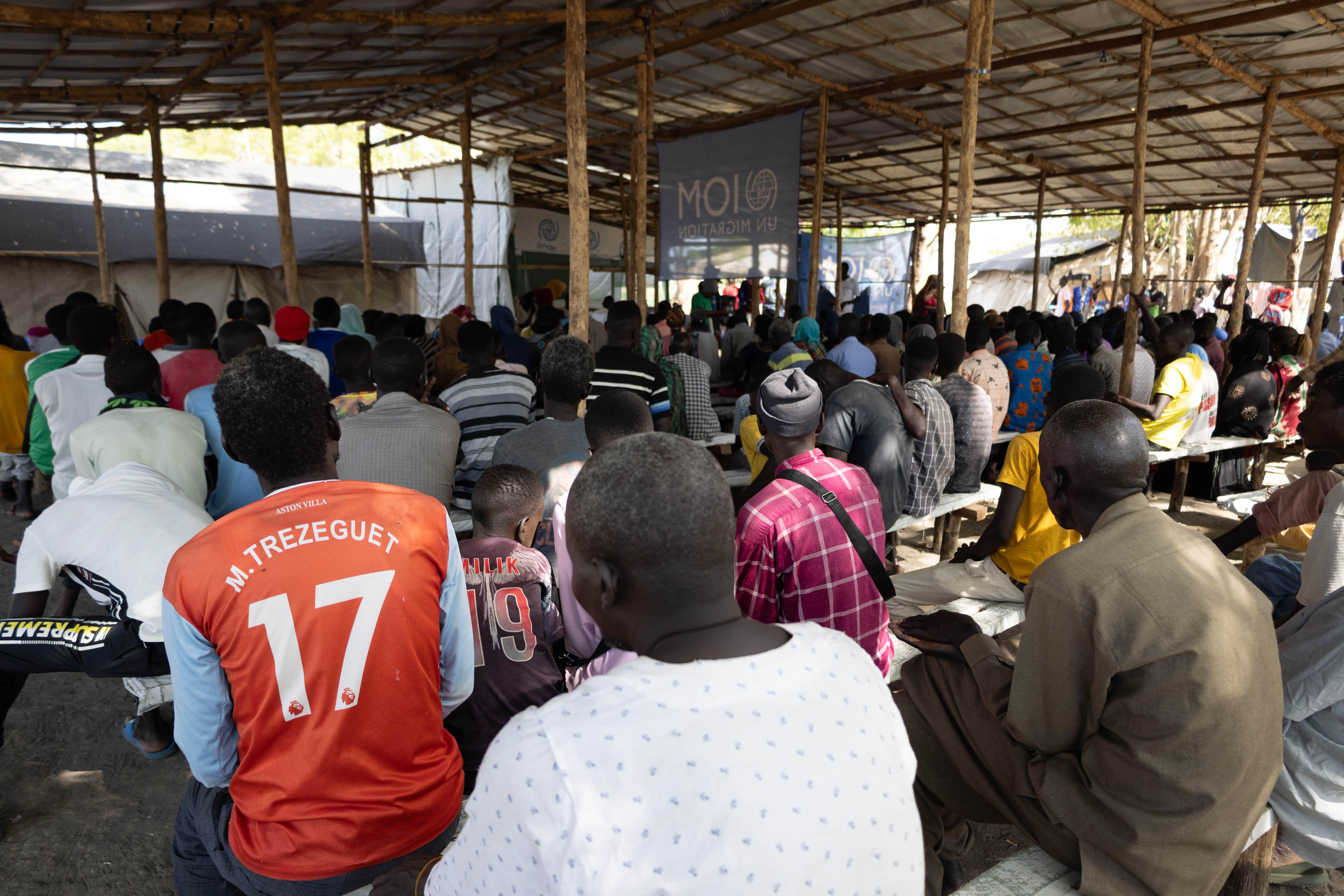 Sudan War & South Sudan Refugees: Hundreds of returnees from Sudan are waiting at IOM registration point after their arrival during the night in Bulukat transit centre.