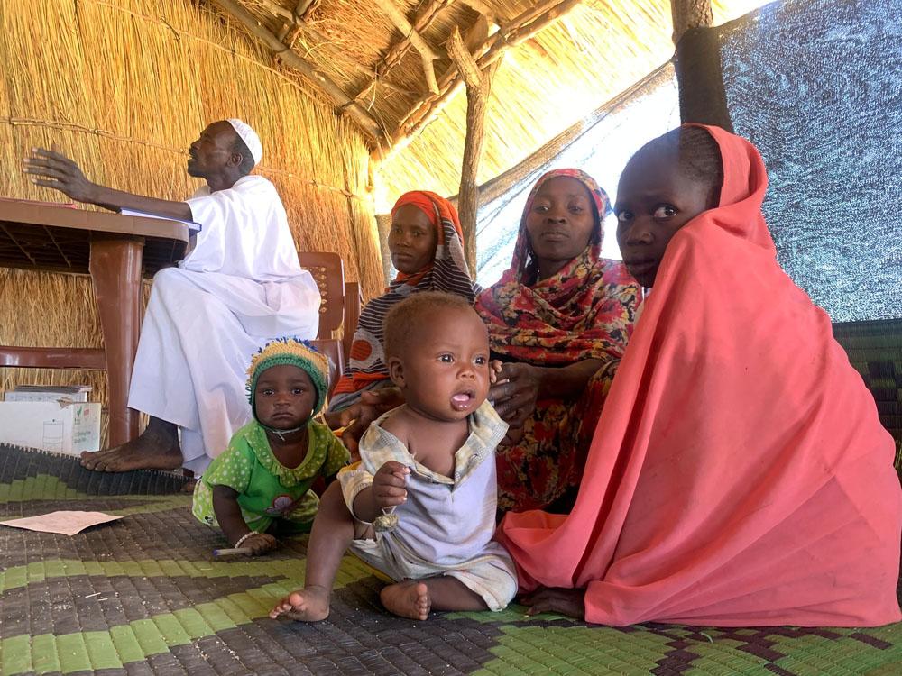 Mabola, her daughter and her 8 month old son Ahmad who suffer from ear infection waiting to be treated at MSF clinic in Dilli village, Jebel Marra mountains, Darfur Region. Sudan